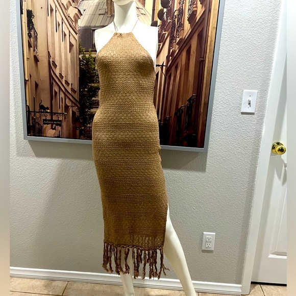 Tied Backless Split Thigh
Fringe Hem Halter Dress - Picture 2 of 11